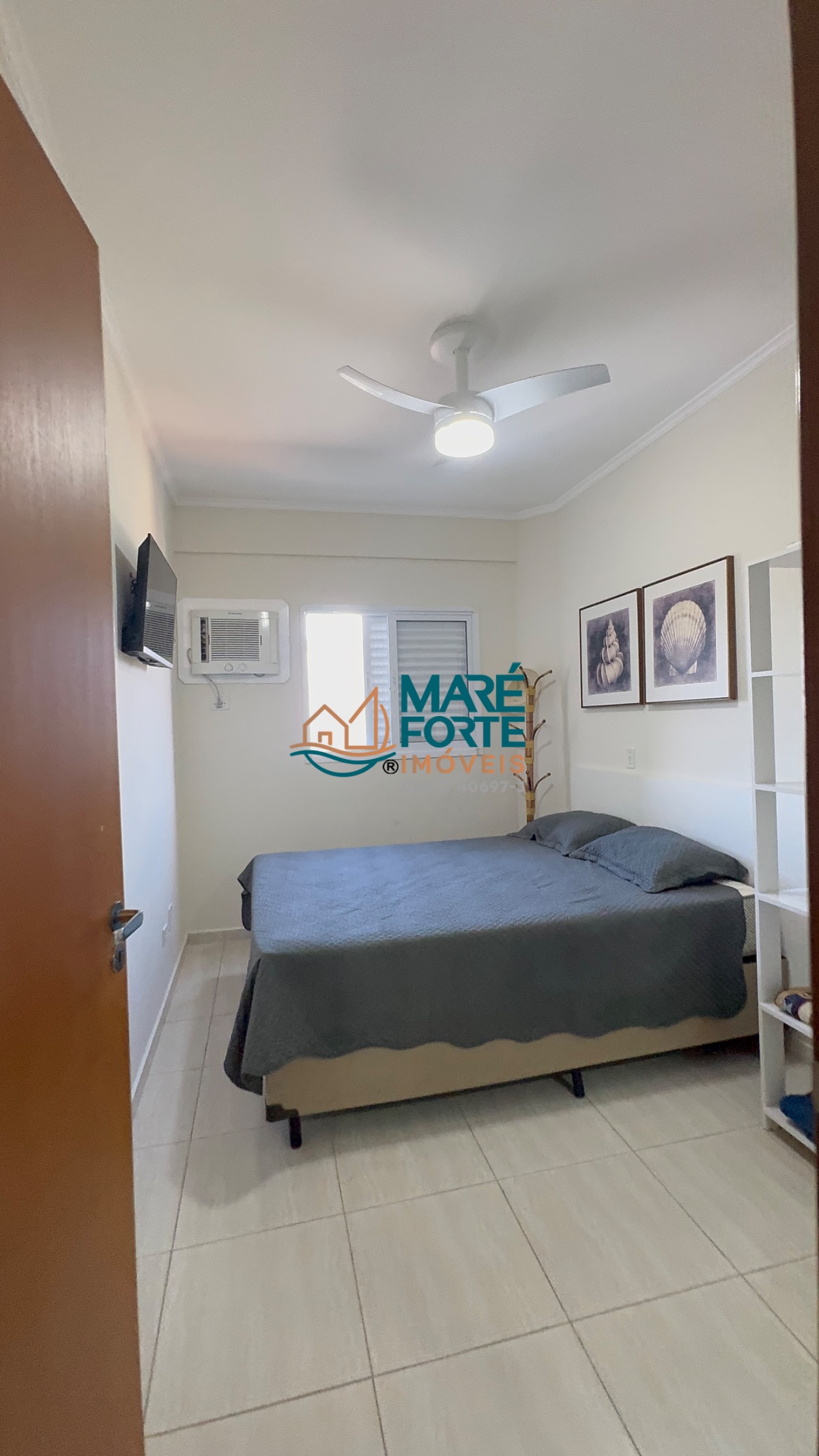Apartamento com dois dormitórios, todo mobiliado apenas 200 metros da orla do Itaguá
